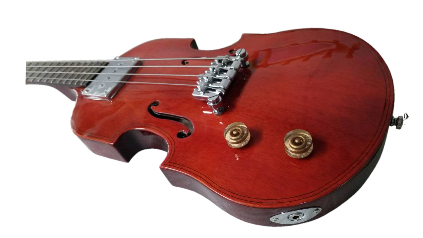 Eastwood Guitars EB 1 Bass LH Natural Mahogany Stain Player POV #color_natural-mahogany-stain
